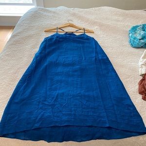 Blue linen dress. Eyelet detail. Fully lined.